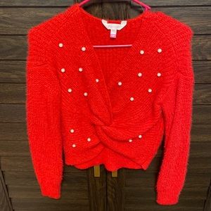Red beaded sweater